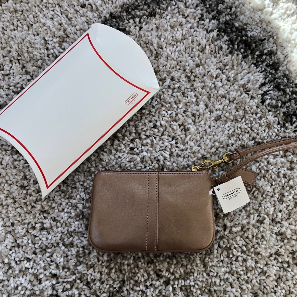 Coach shimmery nude wristlet